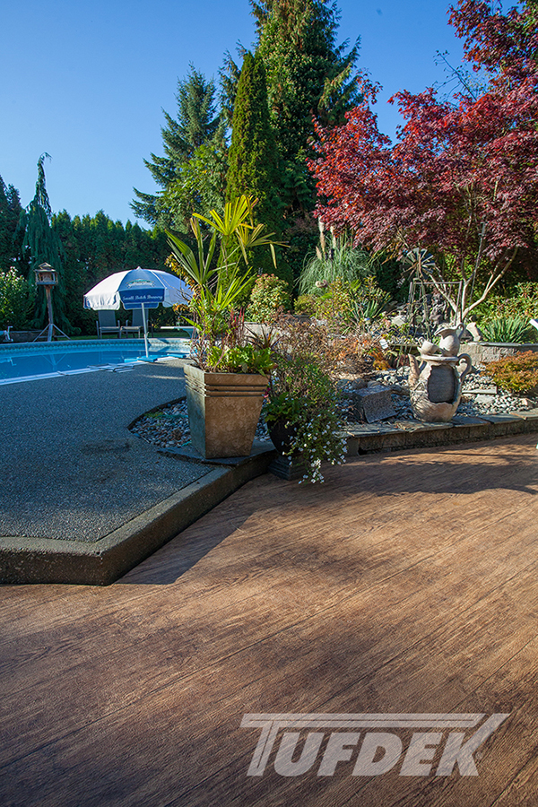 Poolside deck in Vancouver finished with Tufdek Designer Birch Plank