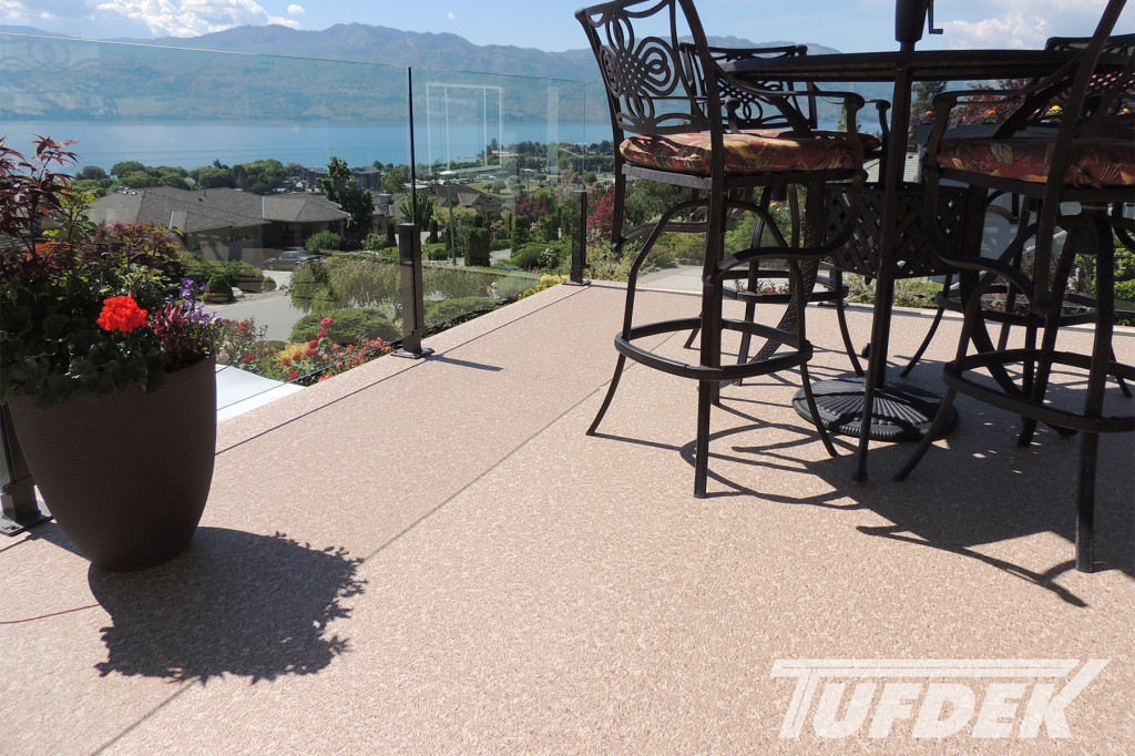 Upper residential deck with Tufdek Supreme Walnut and short post railings